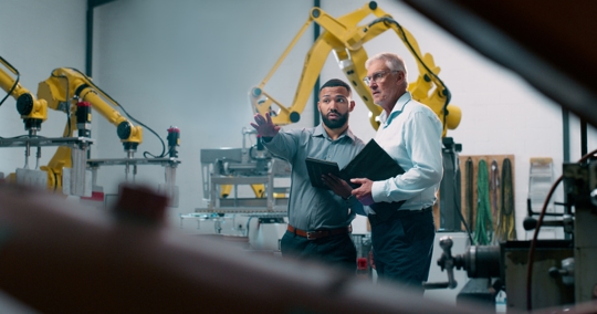 engineers working in manufacturing warehouse